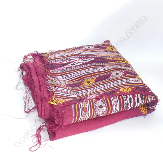 Piece of maroon fabric, embroidered tribal trim. 880x880mm.